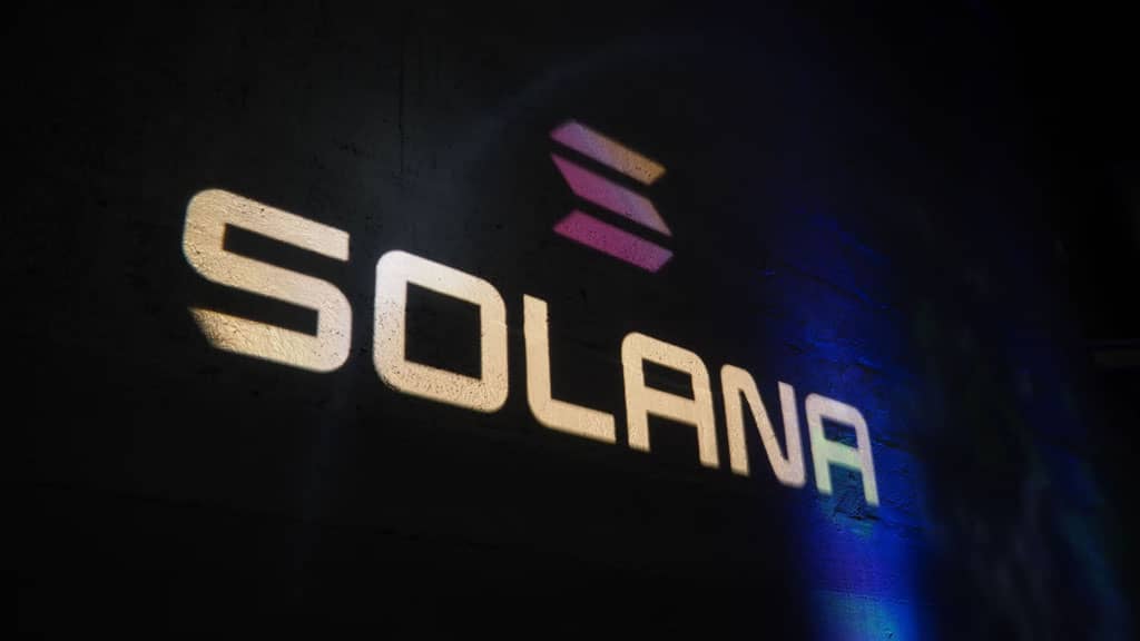 Financial market graphic illustrating Solana’s potential rise to $520, featuring the Solana logo, stock charts, and economic indicators representing market speculation and investor sentiment